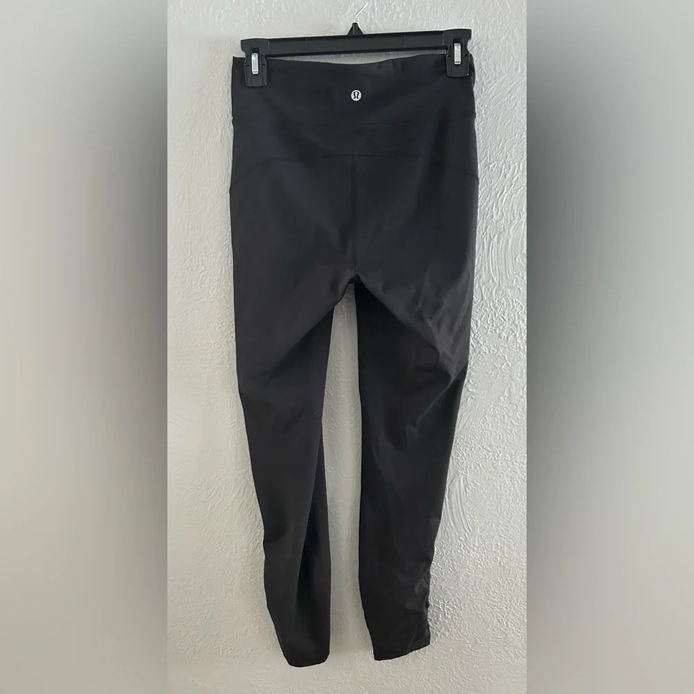 Lululemon Black Tied to It leggings.  Women's size 6, great condition!